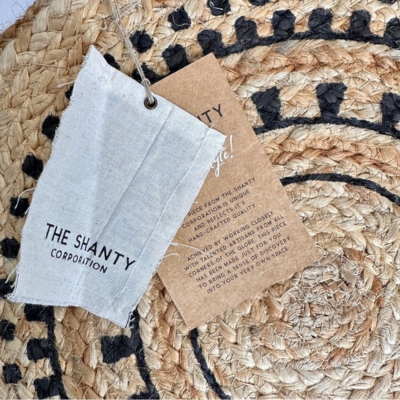 The Shanty Moroccan Round Crossbody Woven Jute Straw Beach Bag in Natural - Picture 4 of 11